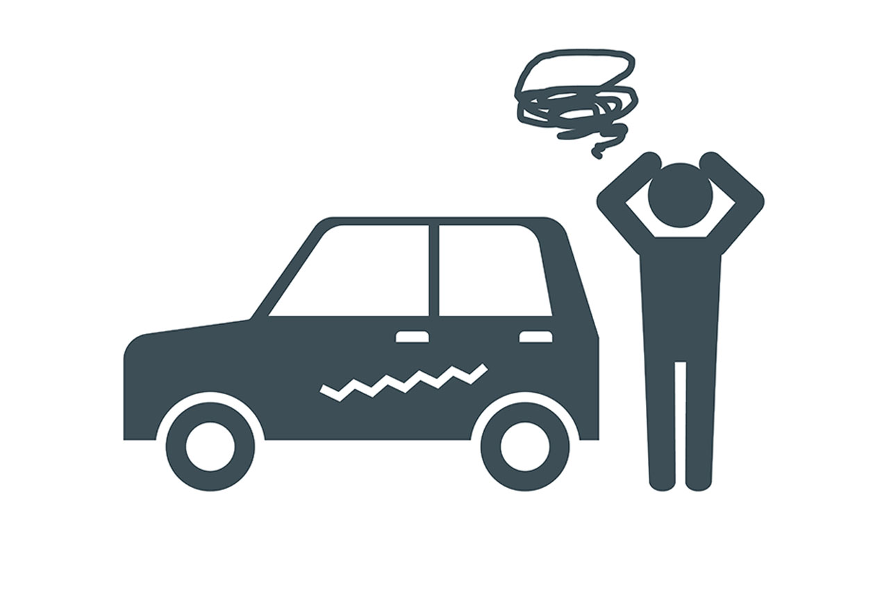 車のトラブルで困っている人のイメージ