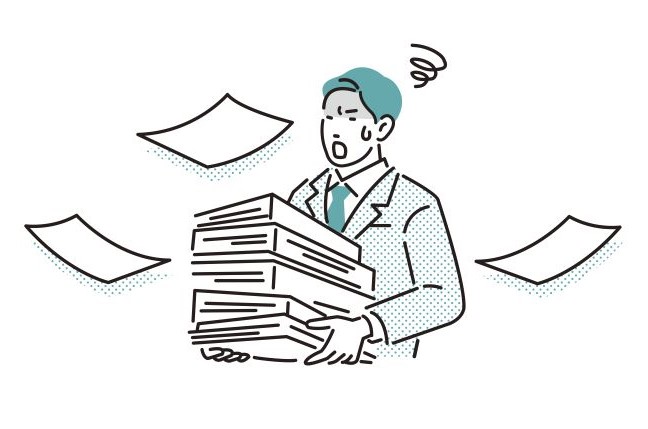 書類の多さに不安を感じている担当者